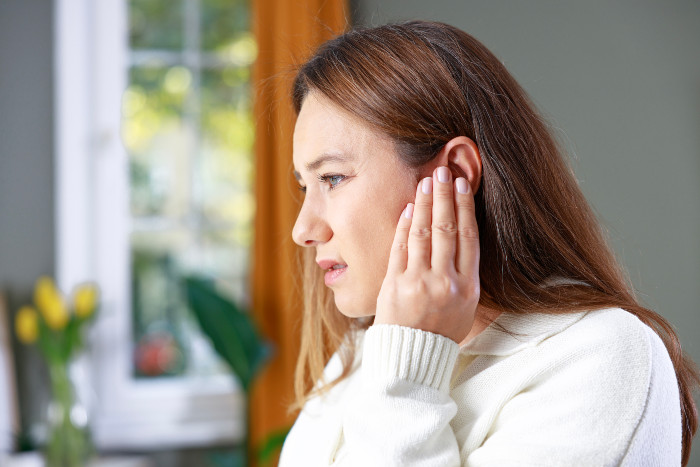 Patient consulting an audiologist for effective tinnitus care in Colorado Springs, CO